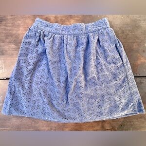 Free People Blue Eyelet mini Skirt with elastic waist and pockets - size small